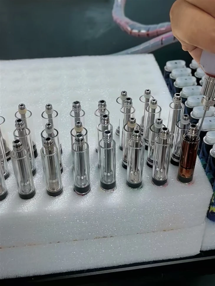GT10 Flex CBD THC HHC Distillate Thick Oil 1ml Vape Filling Machine With Heating Function